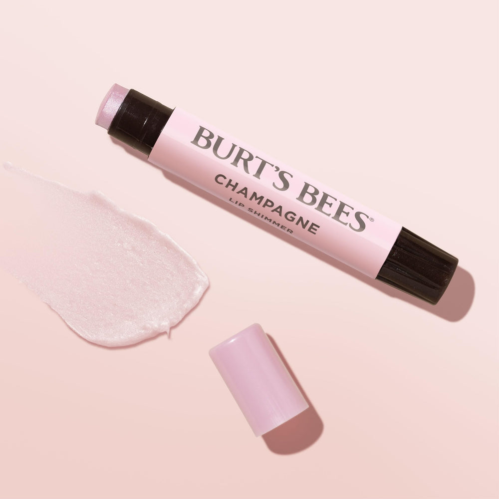 Burt's Bees Shimmer Lip Tint Champagne recyclable carton emphasizes eco packaging.