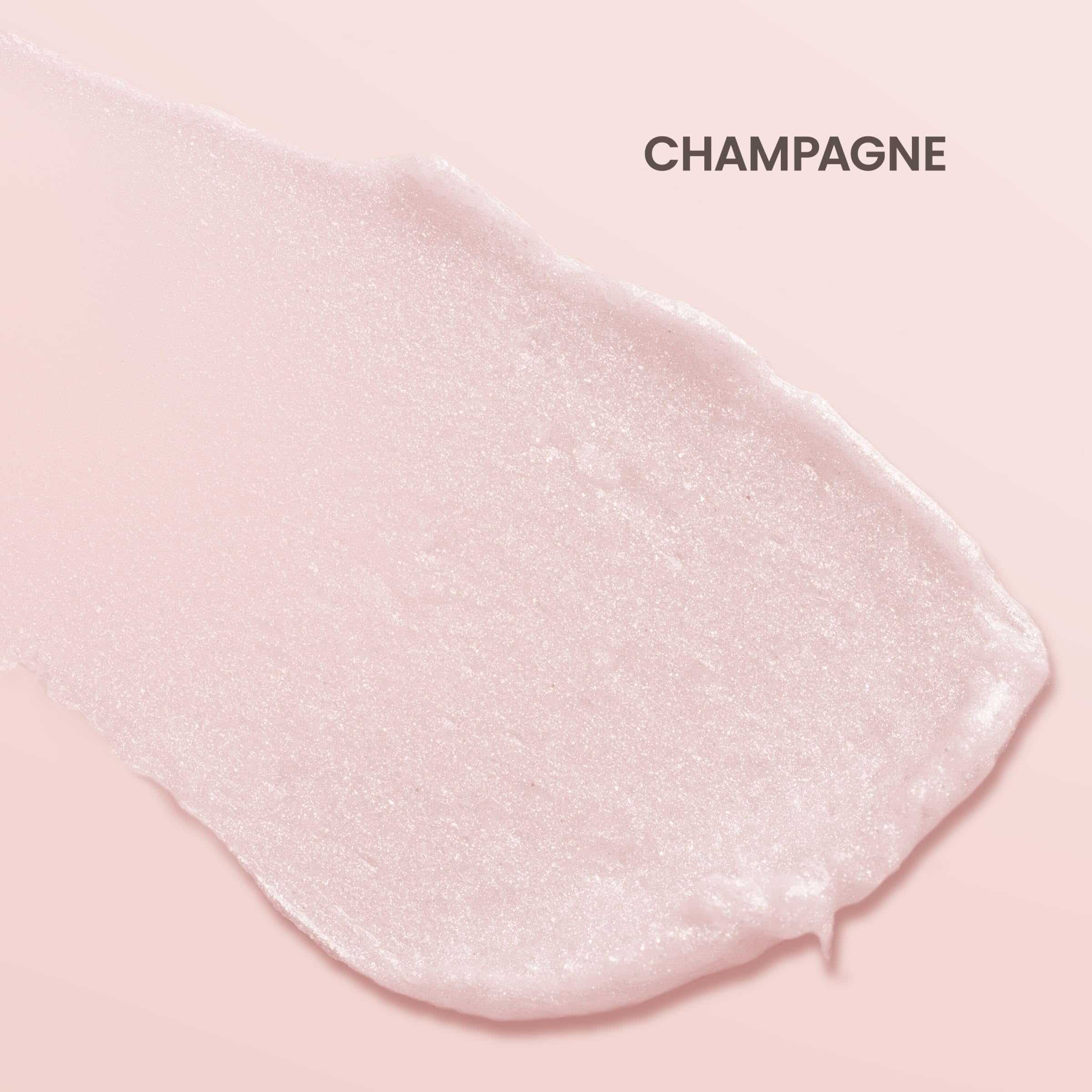 Burt's Bees Shimmer Lip Tint Champagne swatch on skin shows soft glow.
