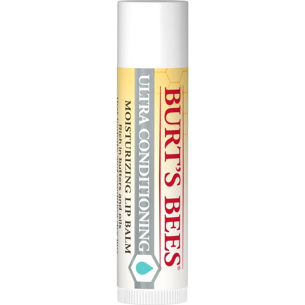 Burt's Bees Ultra Conditioning Lip Balm closeup reveals creamy texture for comfort.