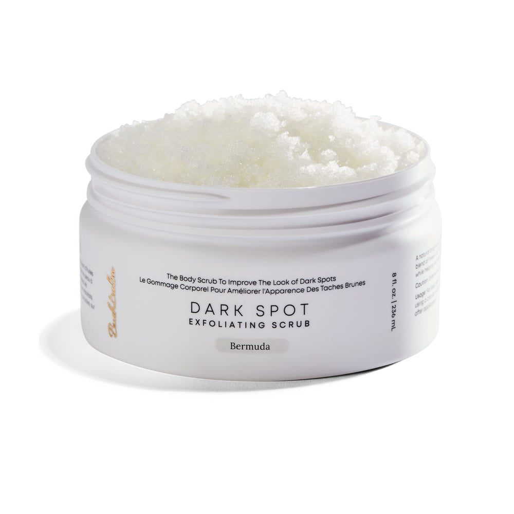 Bushbalm Bermuda dark-spot exfoliating scrub bottle shows pre-shave prep and buffing action.