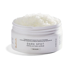 Bushbalm Bermuda dark-spot exfoliating scrub bottle shows pre-shave prep and buffing action.