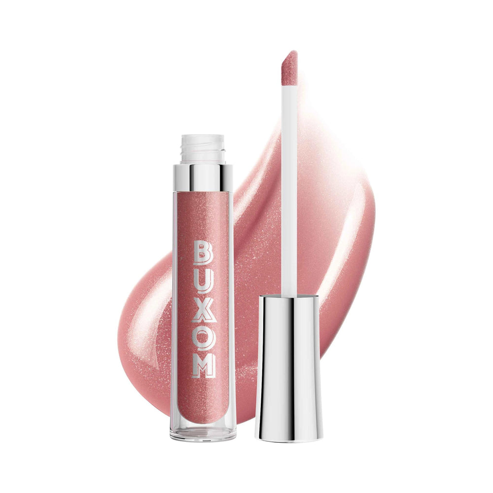 Buxom Full-On Plumping Lip Polish Sugar tube close-up showcases glossy, plump-looking lips.