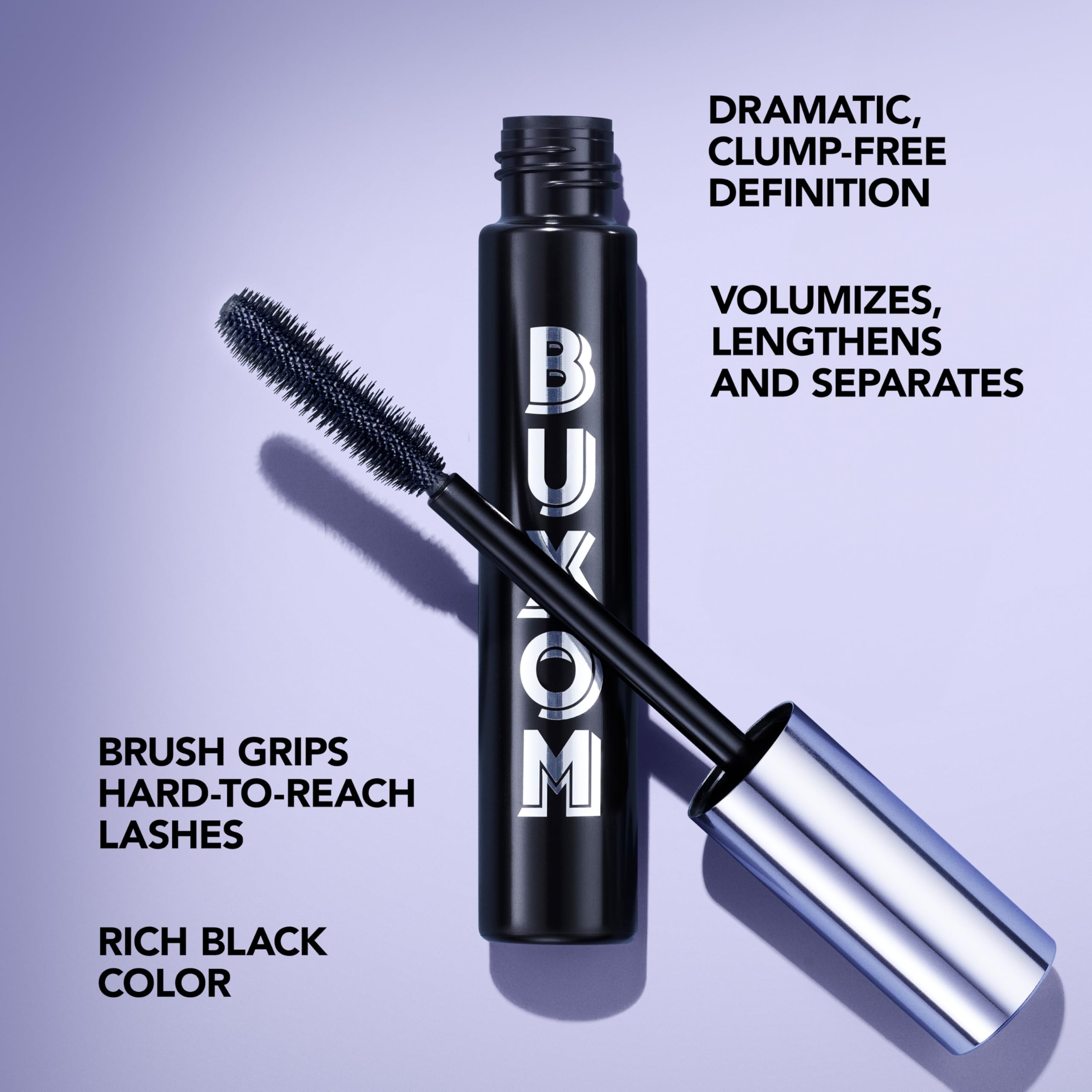 BUXOM mascara brush dense bristles grip every lash for dramatic curl.
