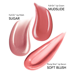 Buxom Plump Shot Lip Serum Soft Blush tube close-up highlighting hydrating plump-looking lips.