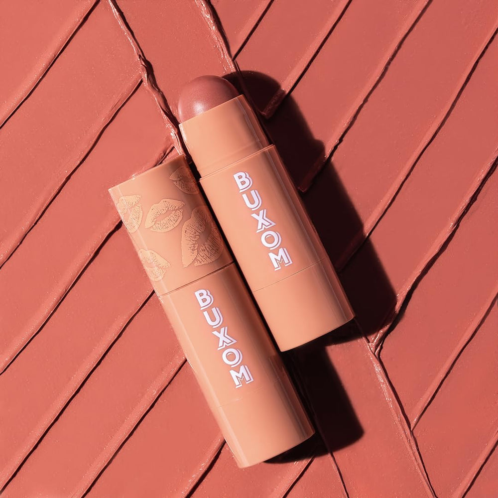 Buxom Power-Full Plumping Lip Balm Inner Glow on lips demonstrates soft, plumped feel.