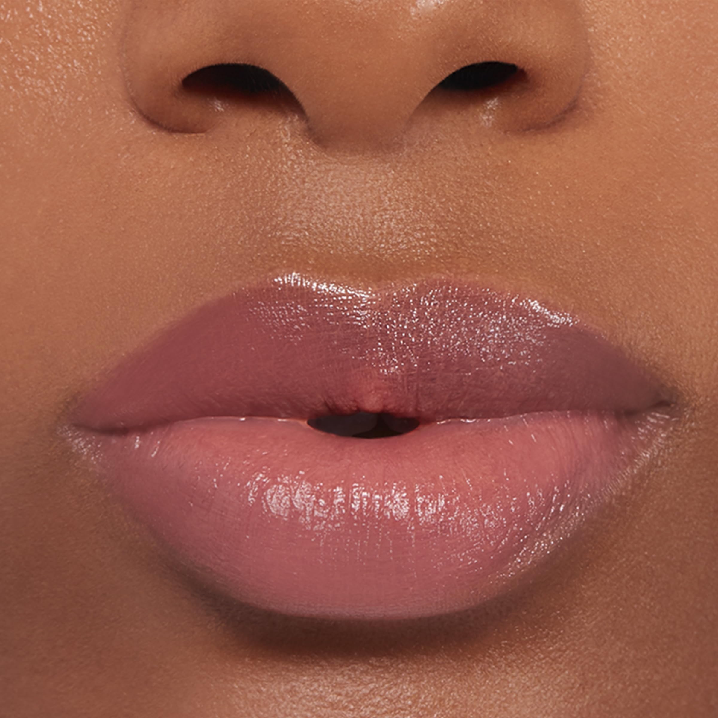 Buxom Power-Full Plumping Lip Balm Inner Glow packaging highlights cruelty-free, paraben-free formula.