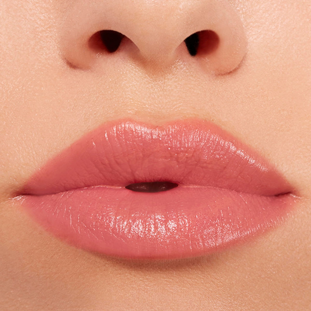 Buxom Power-Full Plumping Lip Balm Inner Glow tube hints at pumpkin seed oil nourishing hydration.