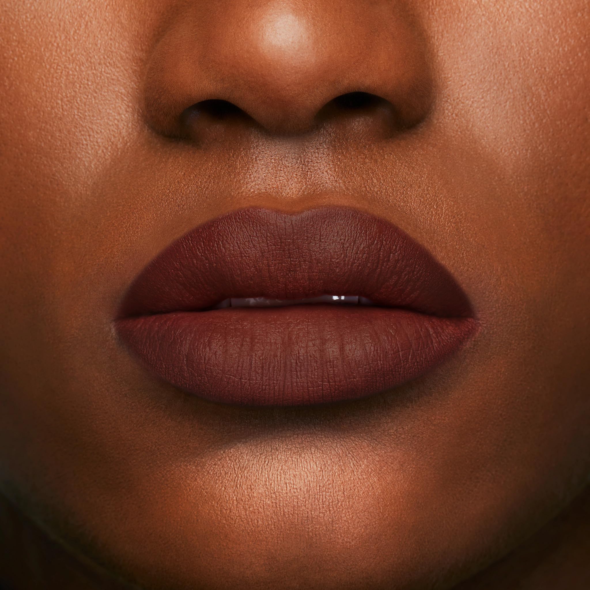 buxom power line lip liner creamy chocolate wear test demonstrates long-lasting color.