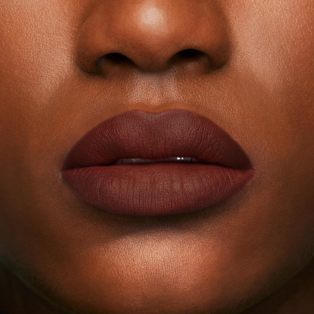 buxom power line lip liner creamy chocolate wear test demonstrates long-lasting color.