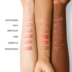 Buxom Trixie lip oil swatch reveals pillowy plump and juicy hydration.