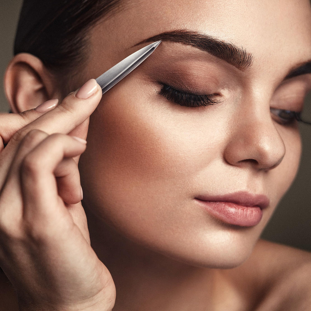 By MILLY fine-tip close-up illustrates versatile use for eyebrows and splinters.