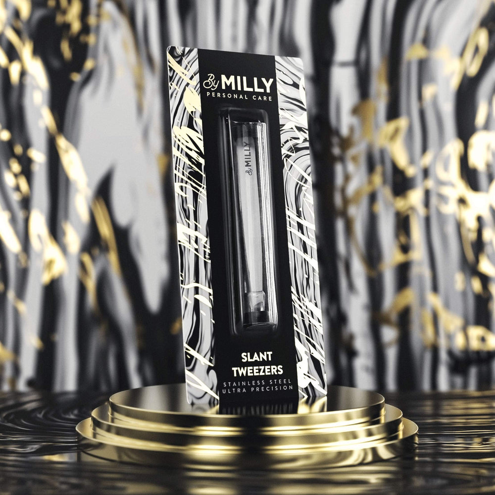 By MILLY high-carbon steel tweezers offer durable performance for long-lasting grooming at home.