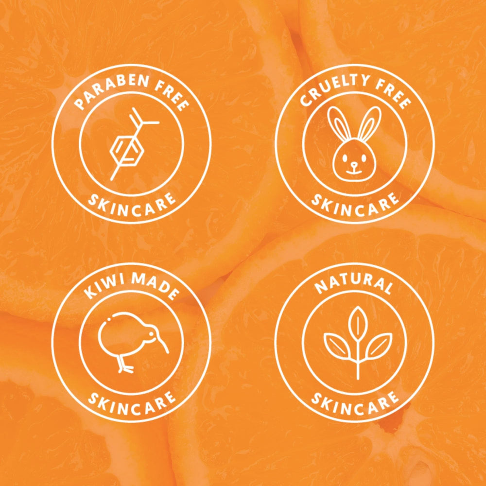 By Nature Vitamin C + Collagen Serum packaging on vanity for premium skincare.