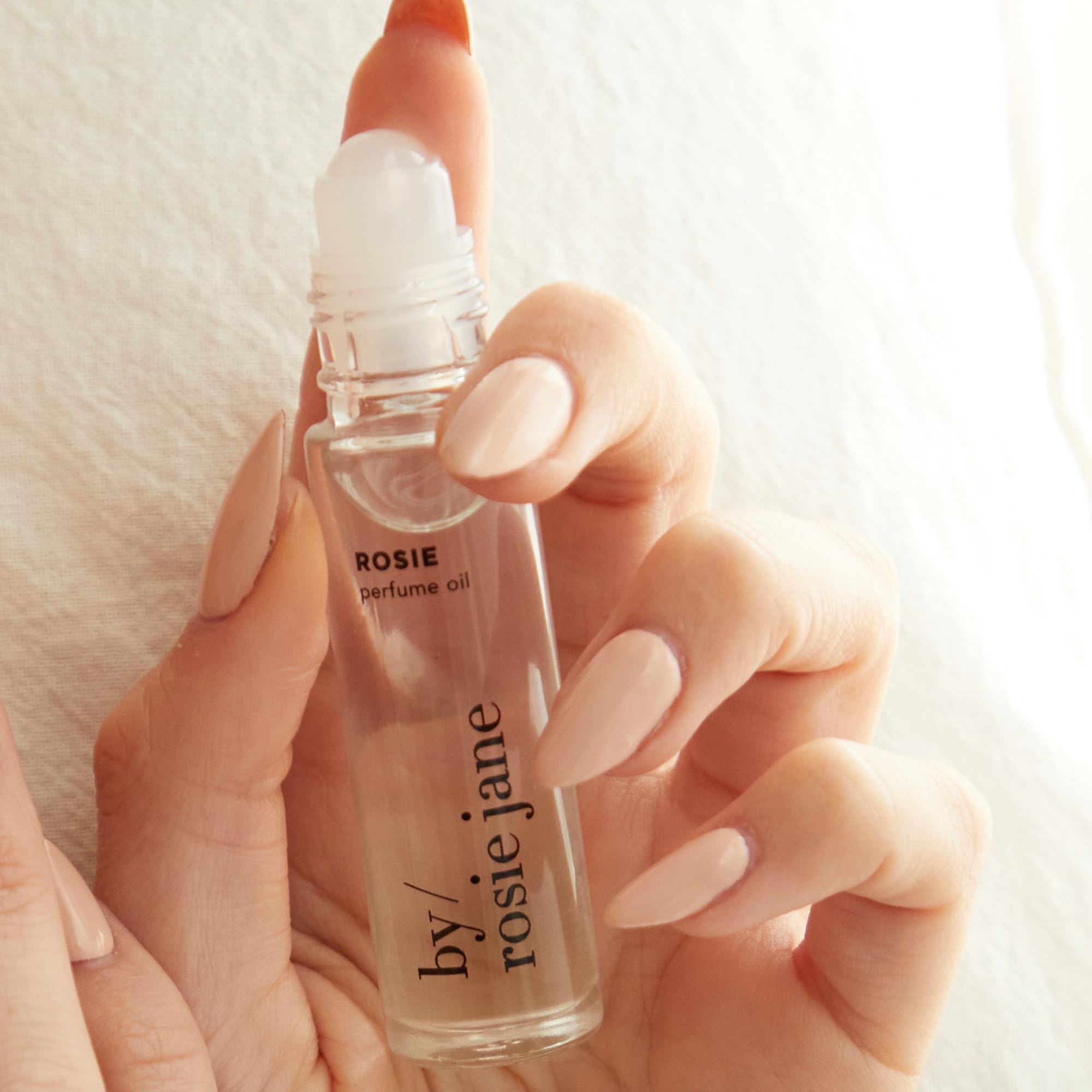 By Rosie Jane Rosie perfume oil applied on wrist showing easy use