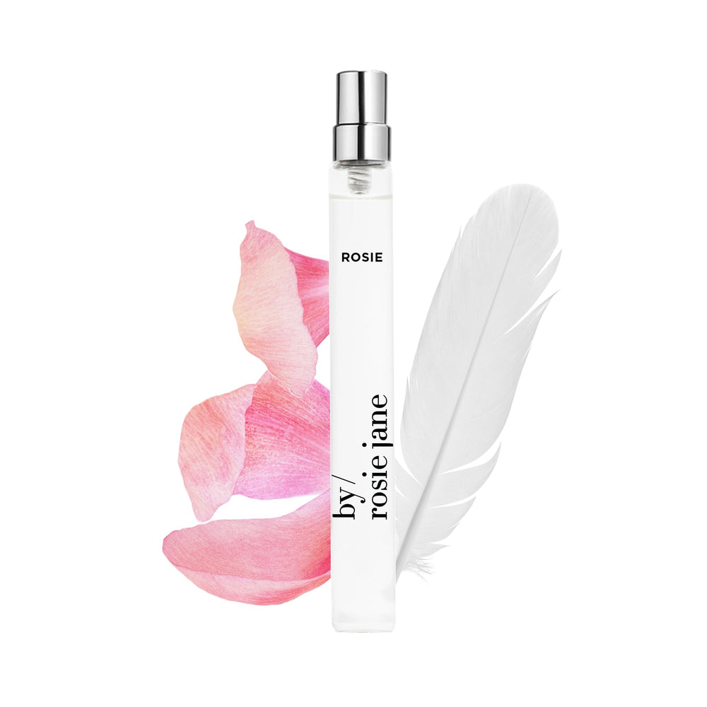 By Rosie Jane travel perfume rose bottle highlights a subtle rose and white musk for on-the-go freshness.