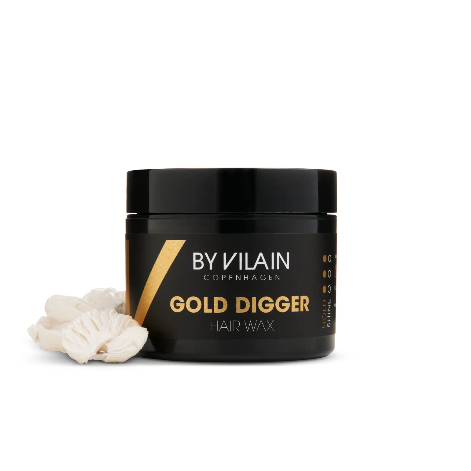 By Vilain Gold Digger hands applying wax for texture and fullness
