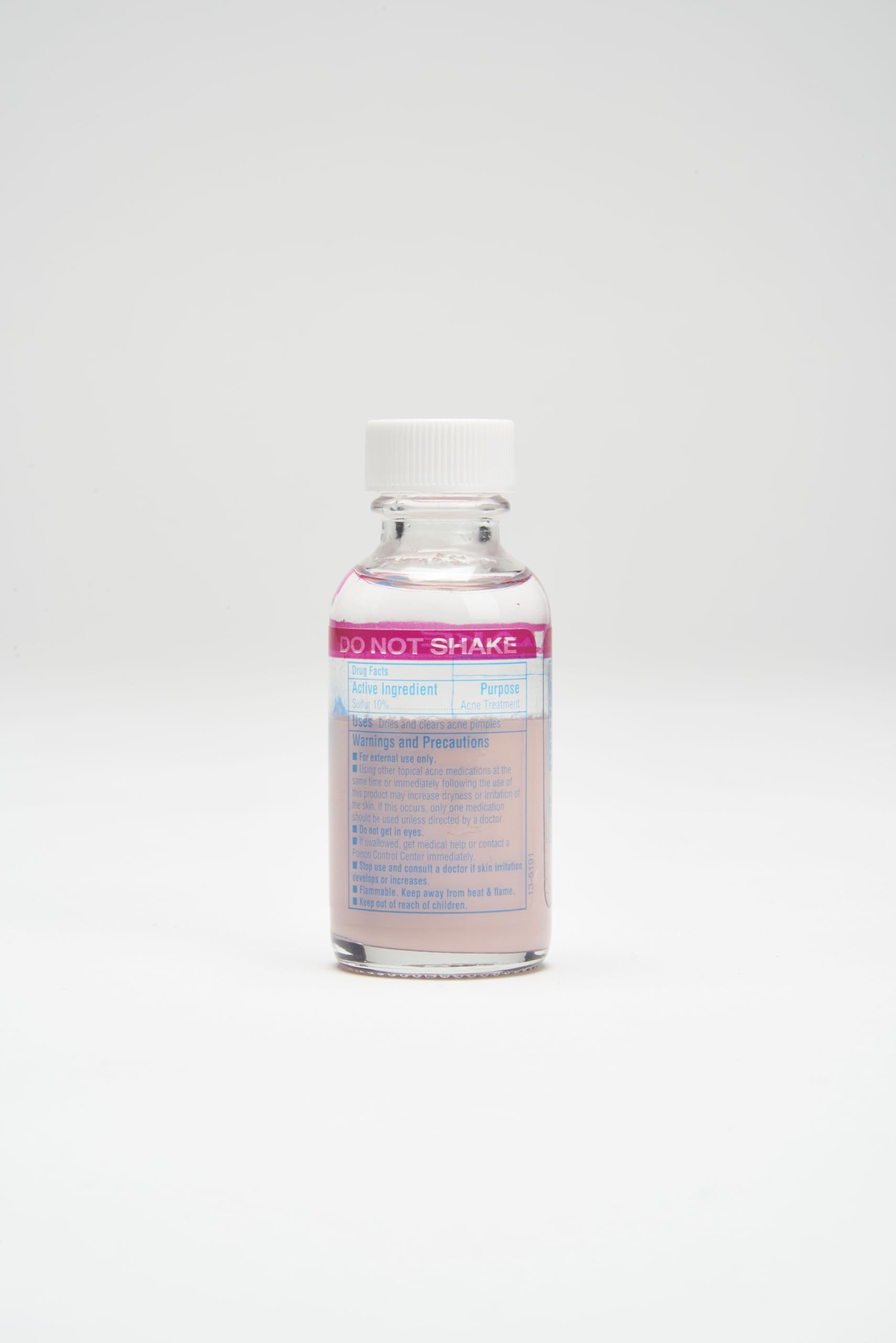 Bye Bye Blemish bottle with simple nighttime routine setup