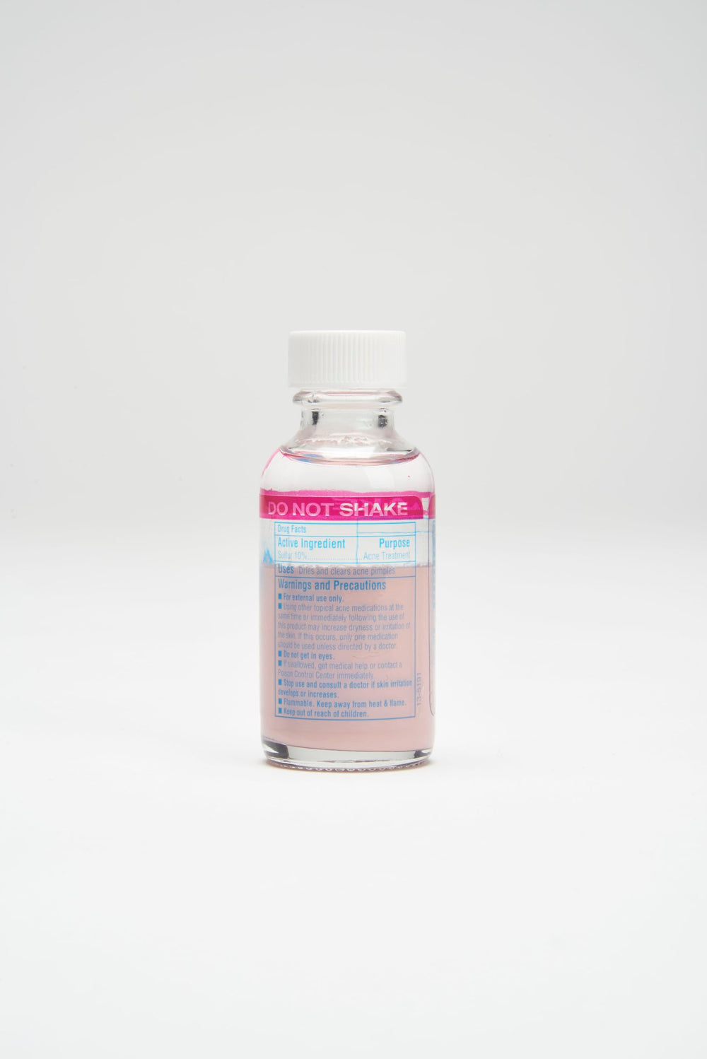Bye Bye Blemish bottle with simple nighttime routine setup