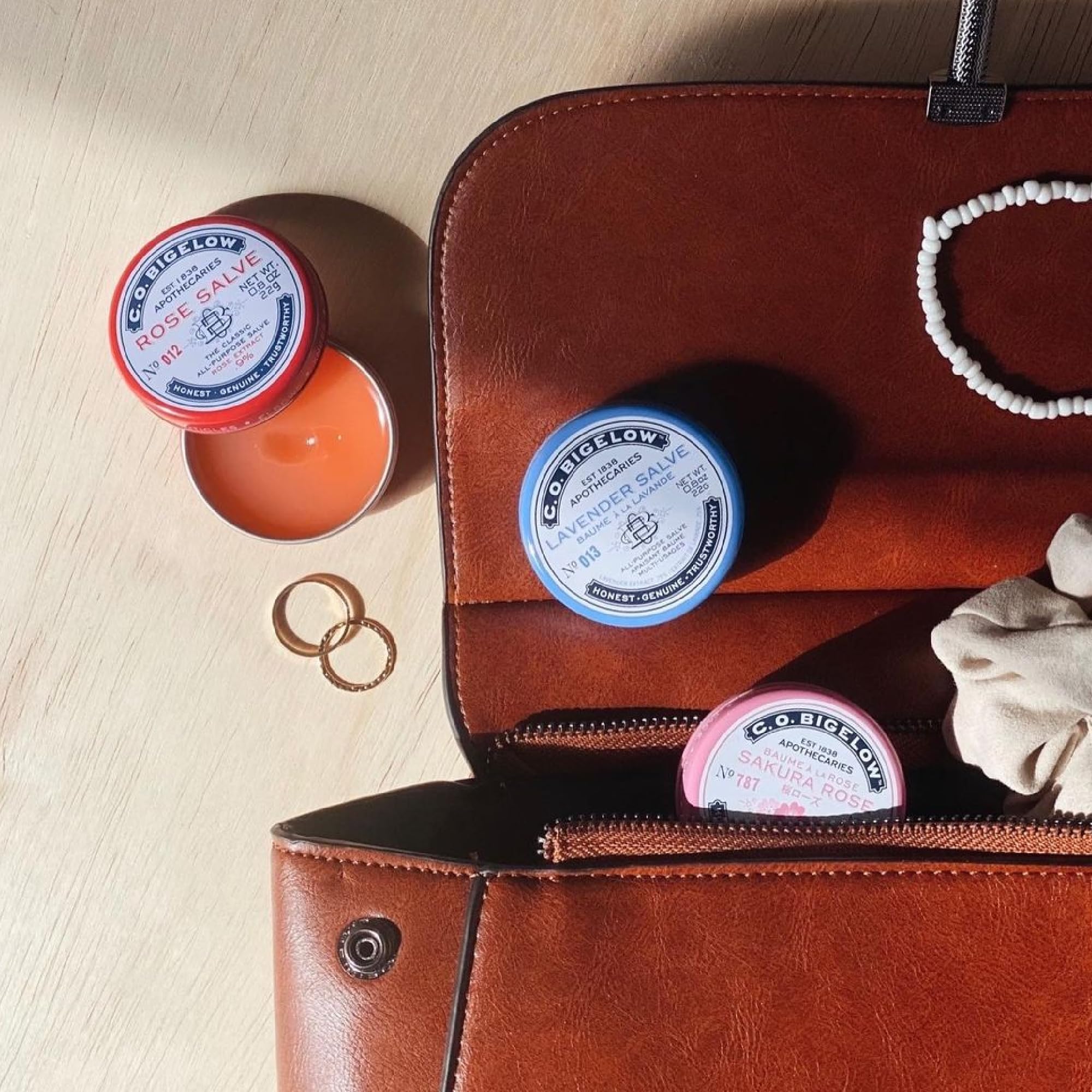 C.O. Bigelow Lavender salve tin on desk with calming fragrance and hydration.