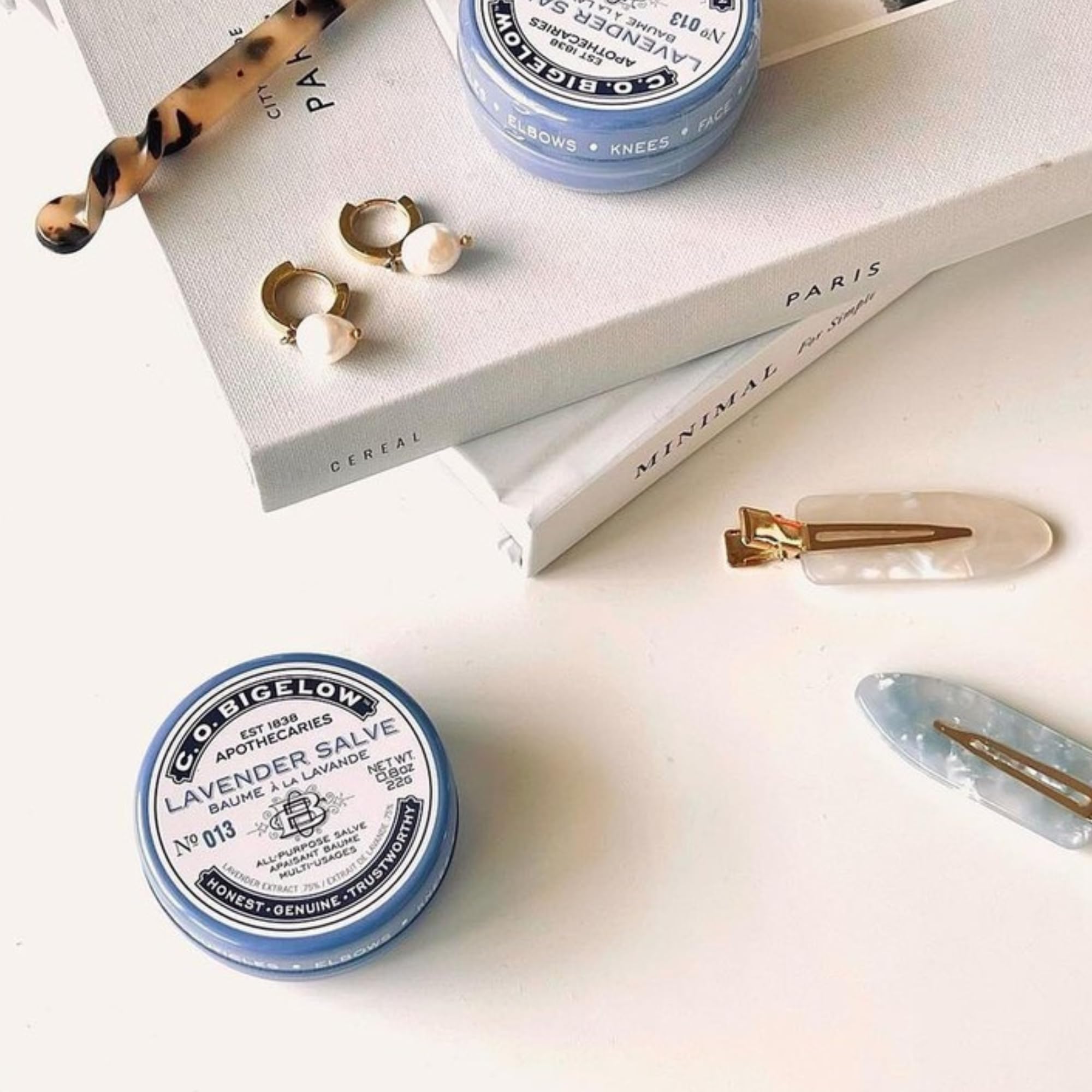 C.O. Bigelow Lavender Salve tin on hands and elbows softening dry skin