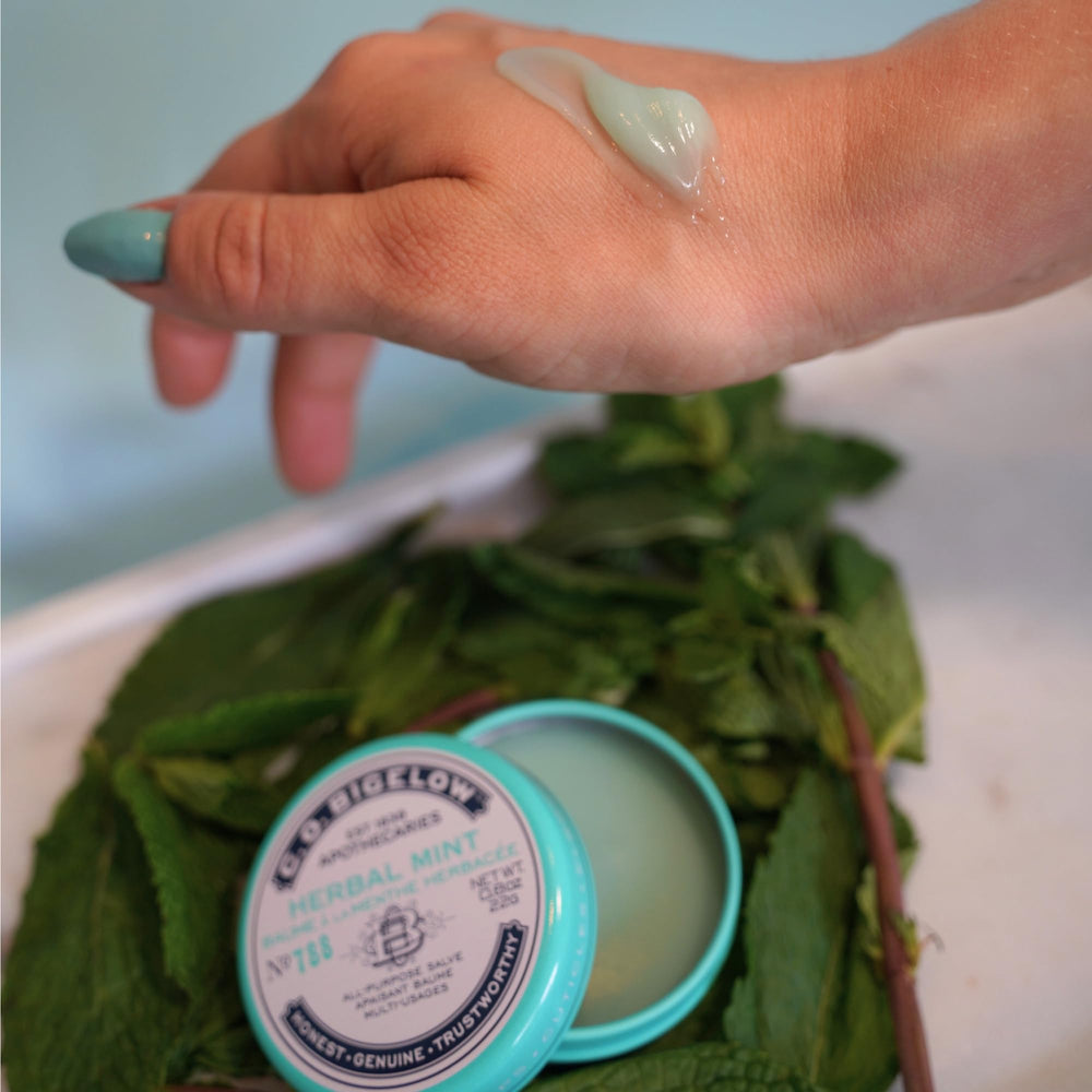 C.O. Bigelow lip-care compact highlighting convenient, all-purpose moisture.