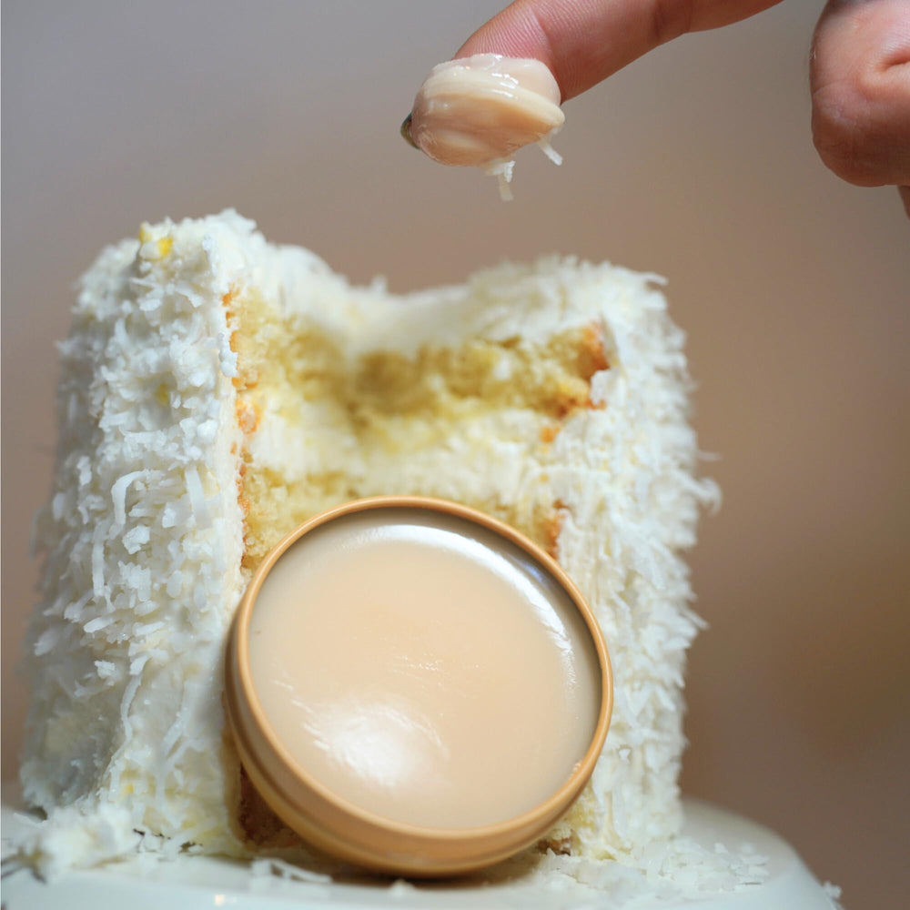 C.O. Bigelow salve-tin hand closeup demonstrating multi-use care for dry skin.