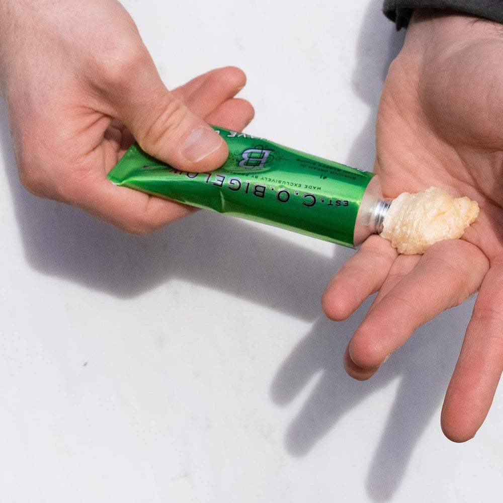 Shaving brush application shows C.O. Bigelow foam builds protective lather.