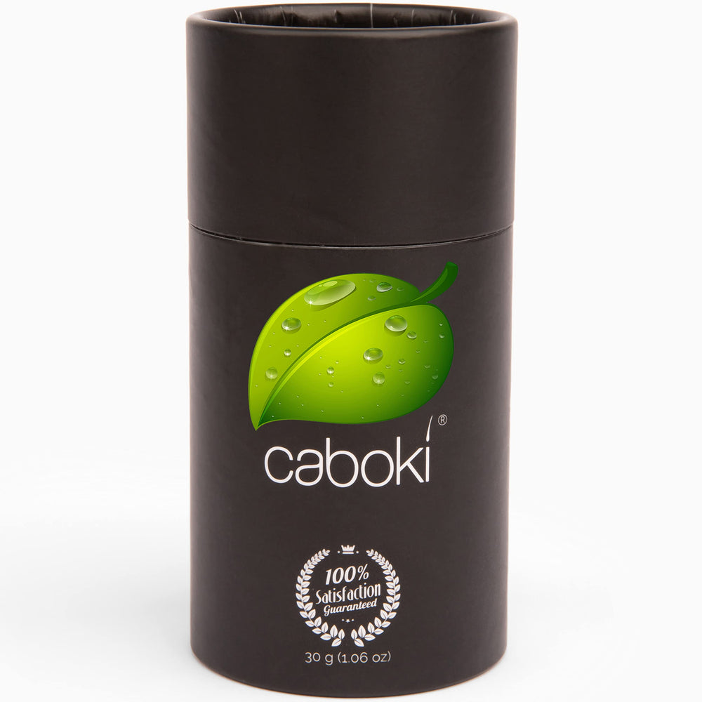 Caboki hair loss concealer bottle pour demonstrates easy fiber dispensing for instant coverage.