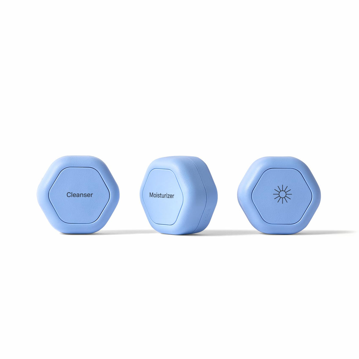 Cadence travel containers closeup of compact capsules for organized on-the-go skincare
