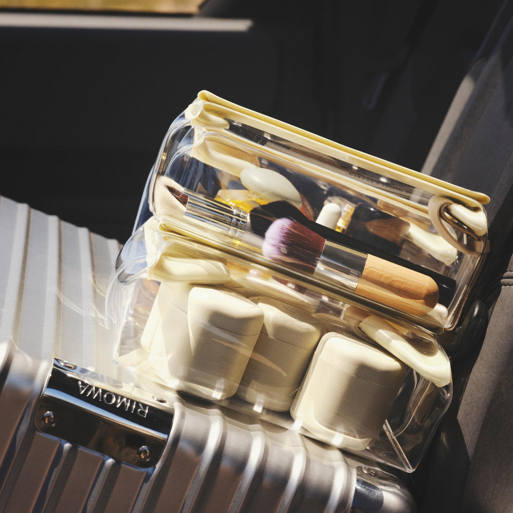 Cadence in-use photo showing magnetic capsules organized in a carry-on