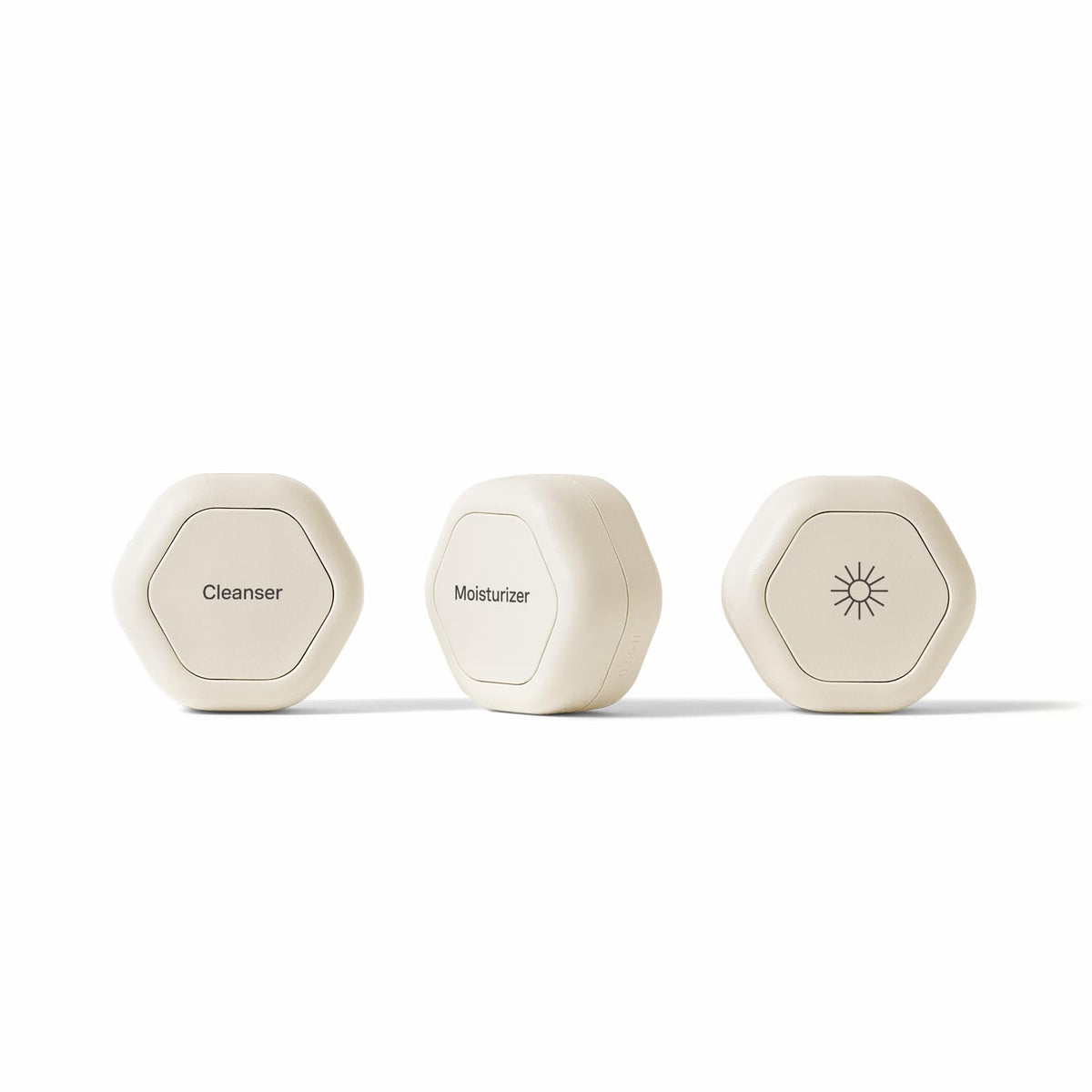 Cadence travel containers with magnetic design for compact, organized skincare on the go.