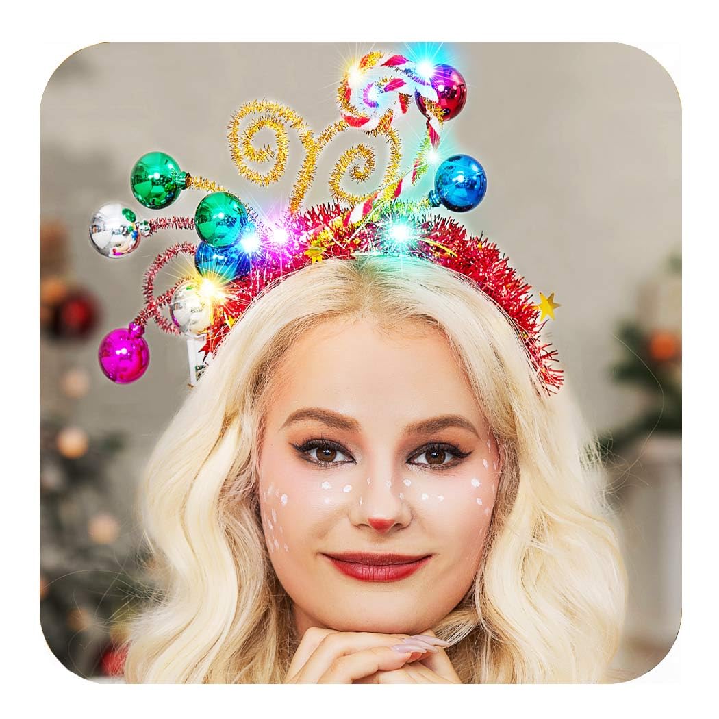 CAKURE Christmas headband with LED balls worn for festive glow and hands-free sparkle.