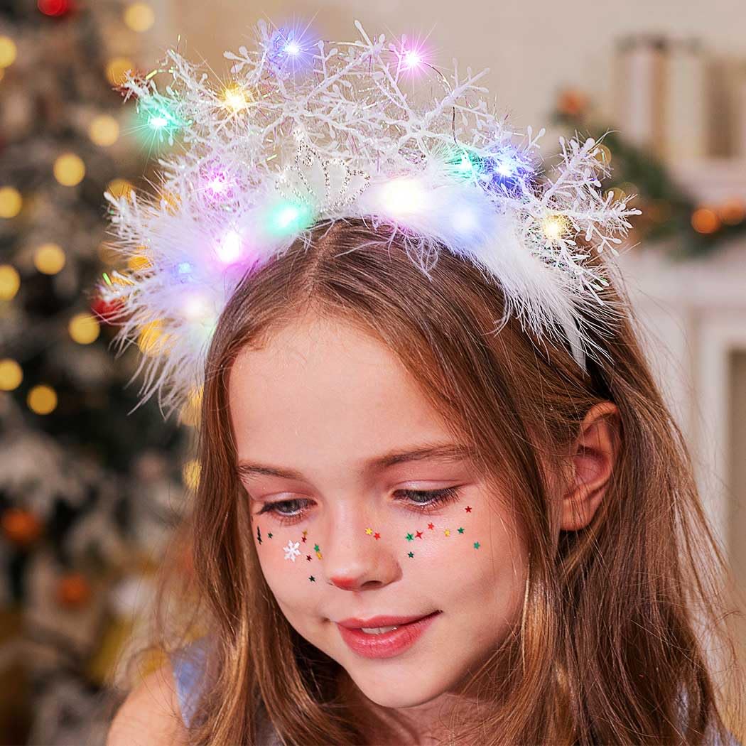 CAKURE light-up snowflake headband showing flexible wearable-fit for comfort