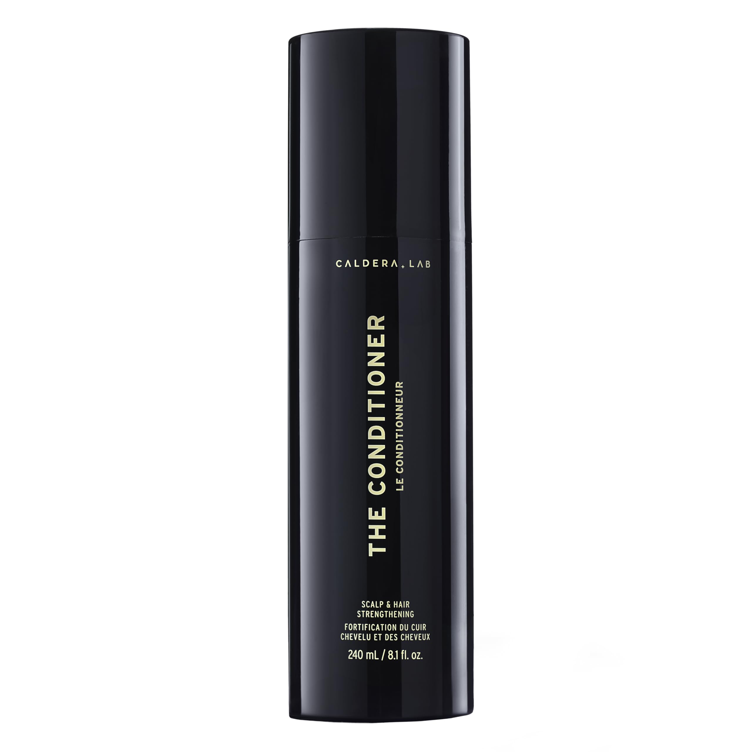Caldera + Lab conditioner bottle closeup, showcasing hydrating formula for softer, shinier hair.