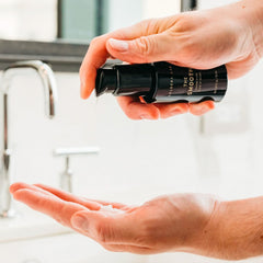 Close-up of The Smooth texture showing creamy exfoliating shave elixir.