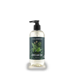 Caldrea hand soap bottle pour shows juniper laurel mint aroma and skin friendly formula for refreshing hand cleansing