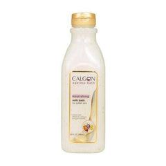 Calgon Ageless Bath Nourishing Milk Bath bottle pour for a luxurious soak.