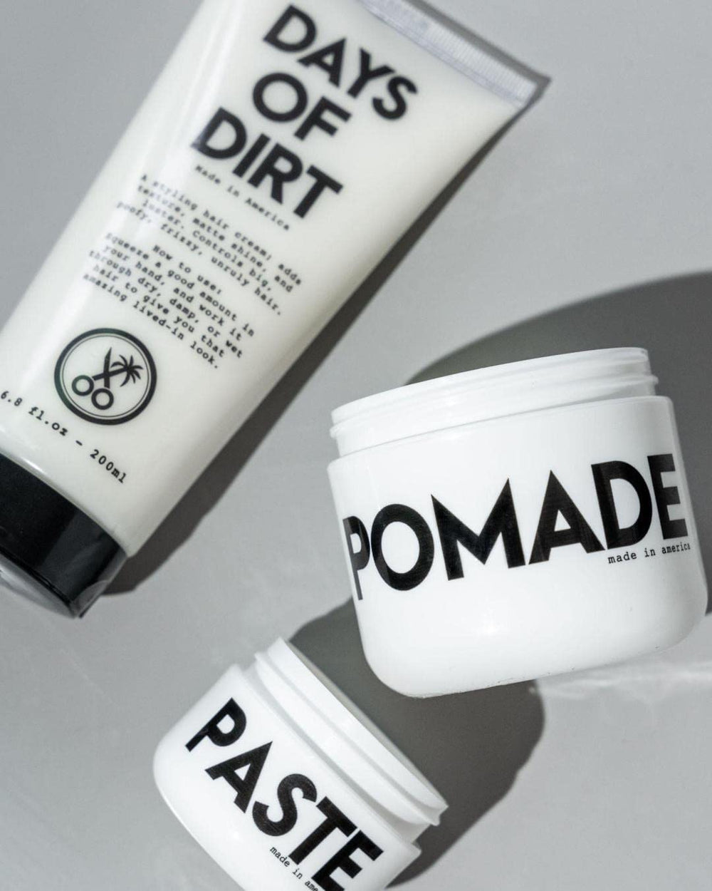 California Born Days of Dirt travel-friendly tube packaging shown for on-the-go routine.