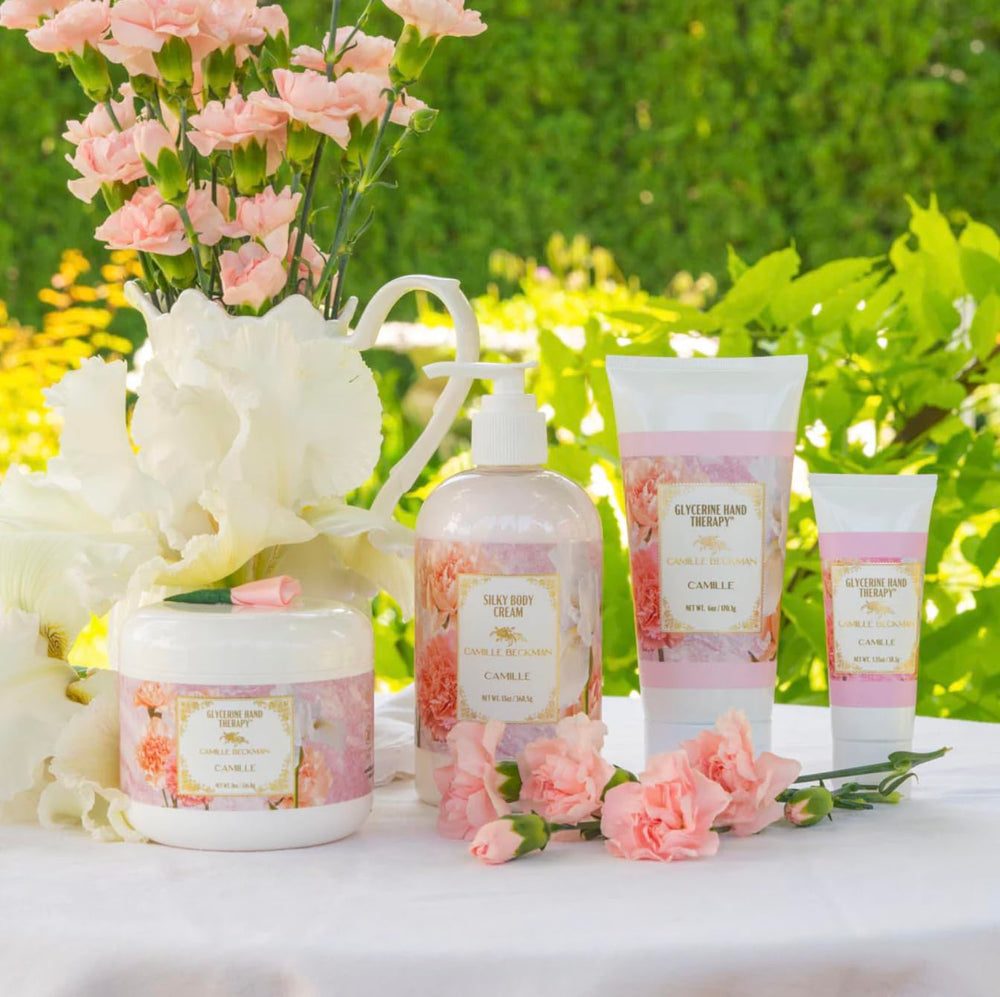 Camille Beckman hands application showcases everyday moisture and soft glow.