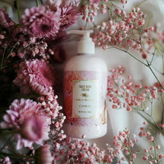 Camille Beckman label highlights almond oil, glycerin, and herbal extracts.