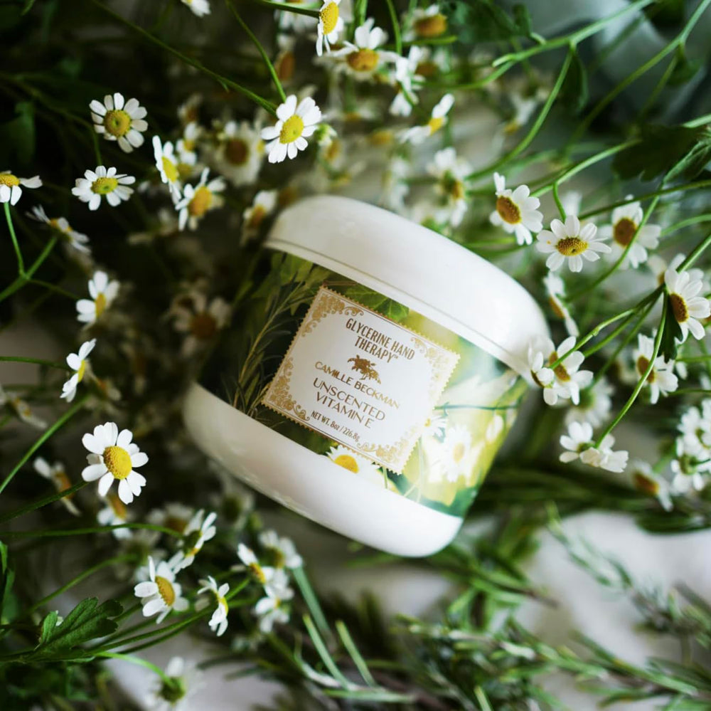 Camille Beckman glycerine hand therapy cream application demonstrates easy rub-in for soft hands.
