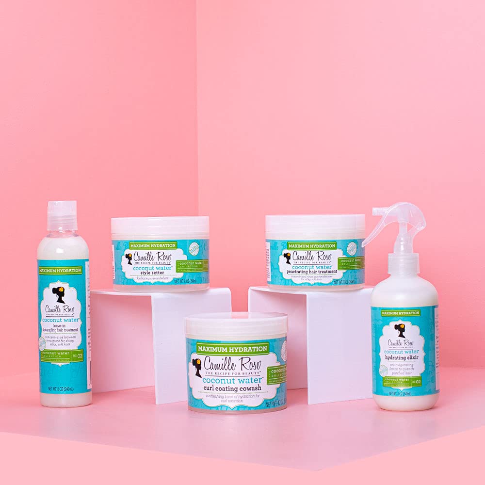 Camille Rose Coconut Water Curl Cleanse foamy lather ready to distribute through hair