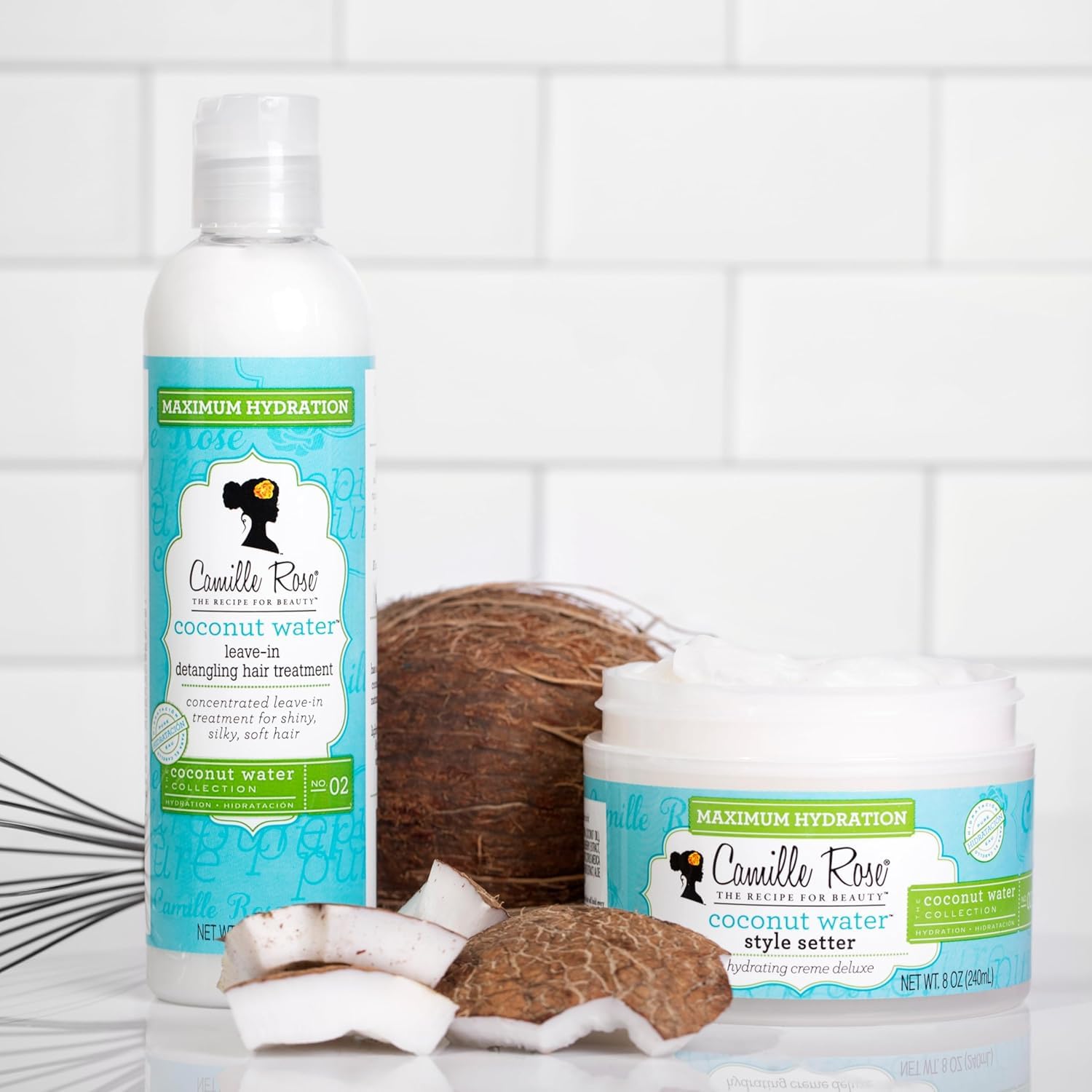 Camille Rose Coconut Water Style Setter coconut oil shine on curly strands.