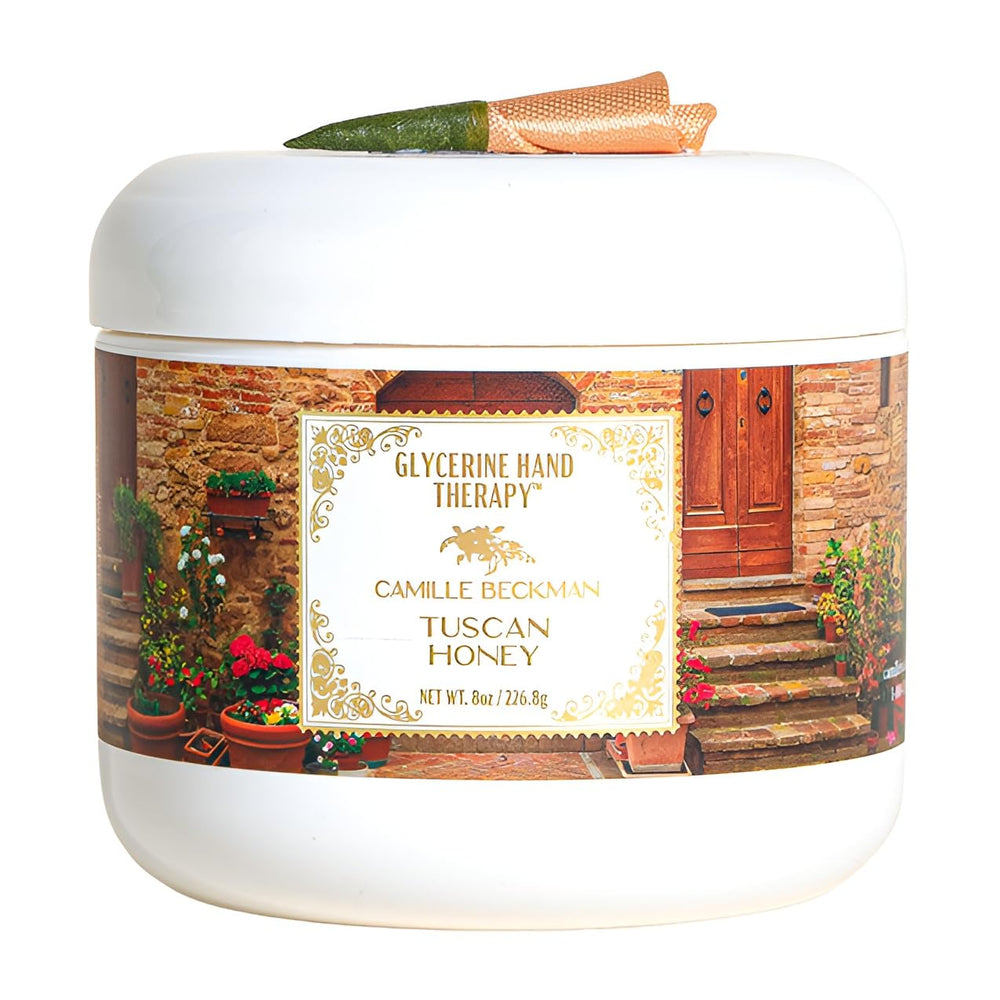Camille Beckman glycerine hand therapy cream Tuscan Honey label closeup showing nourishing skin.