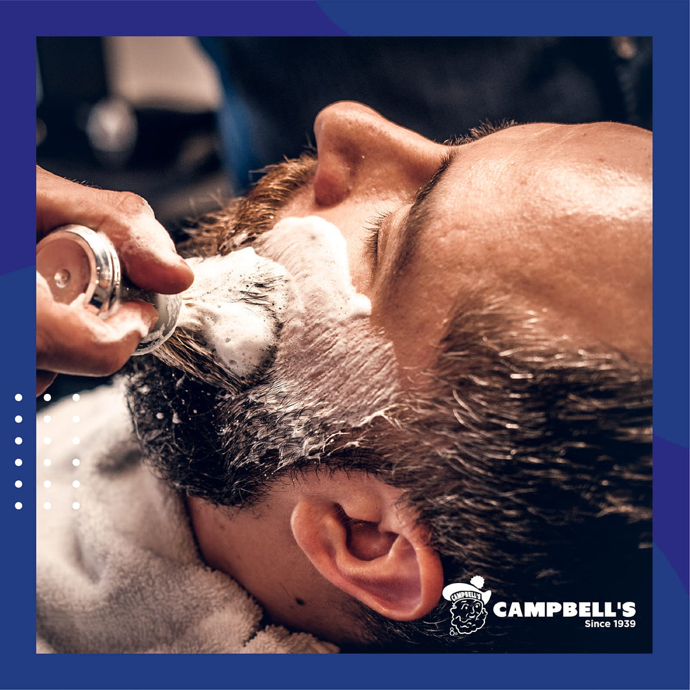 Vintage Campbell’s brand history sign highlighting decades of professional barber products.