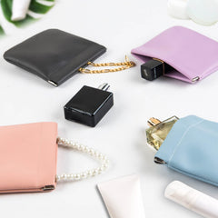 CANIPHA sky-blue lambskin pocket cosmetic bag keeps small items organized during travel.