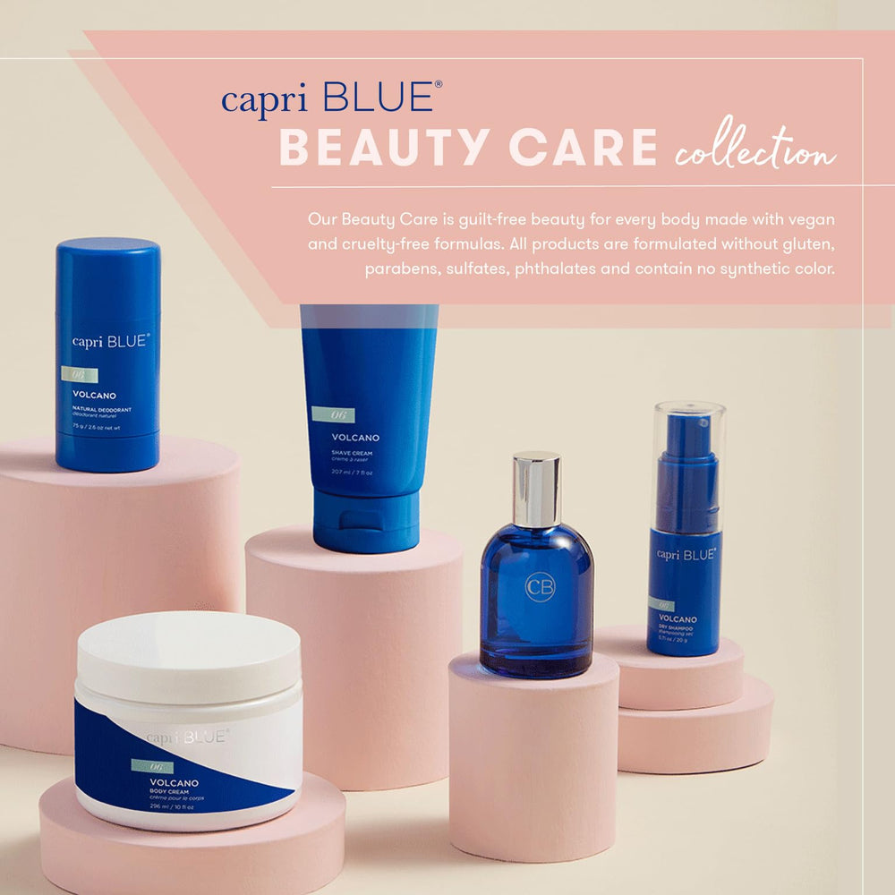Capri Blue Volcano Bubble Bath spa scene with candle for a relaxing evening.