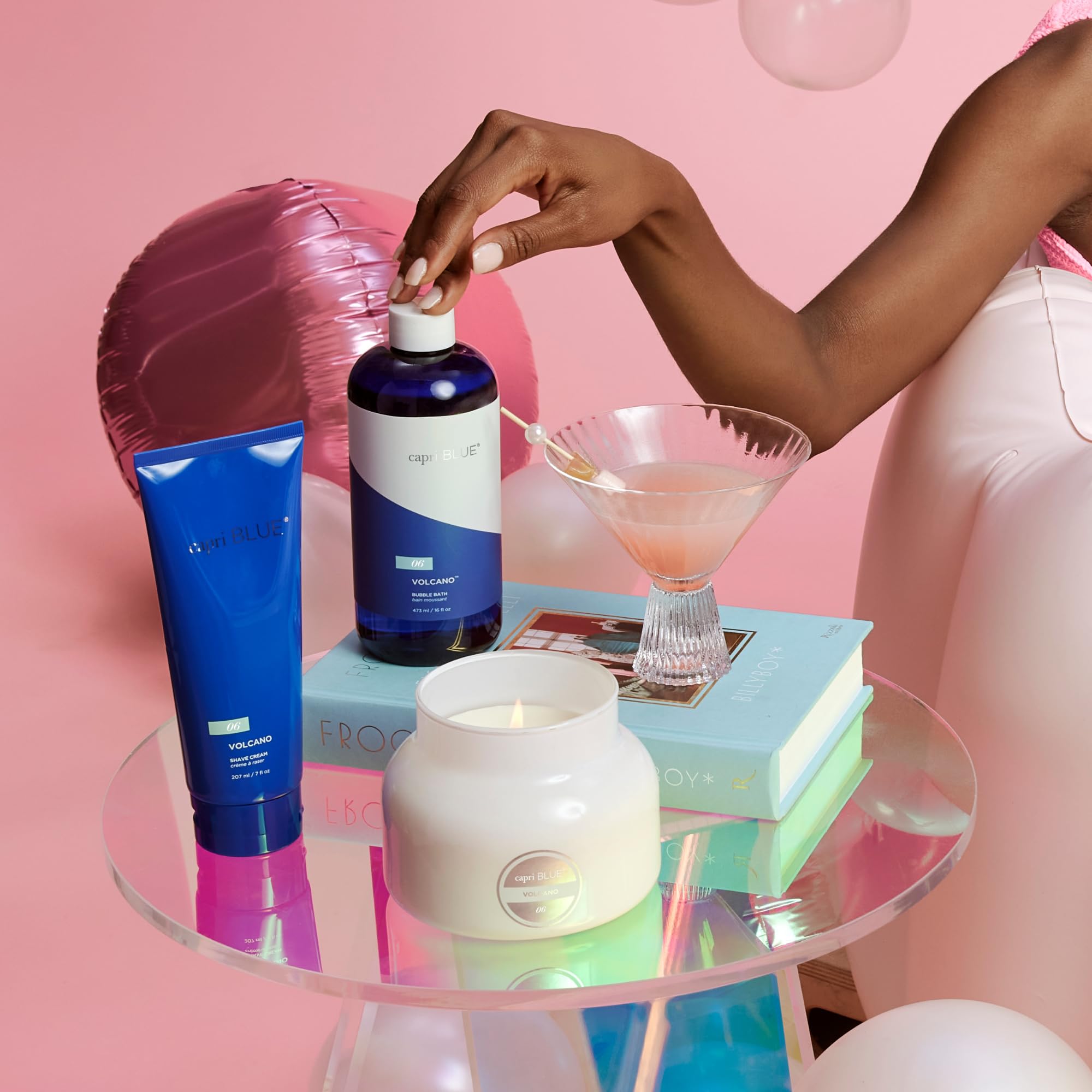Capri Blue Volcano Bubble Bath highlighting watermelon and pomegranate ingredients soothing skin.