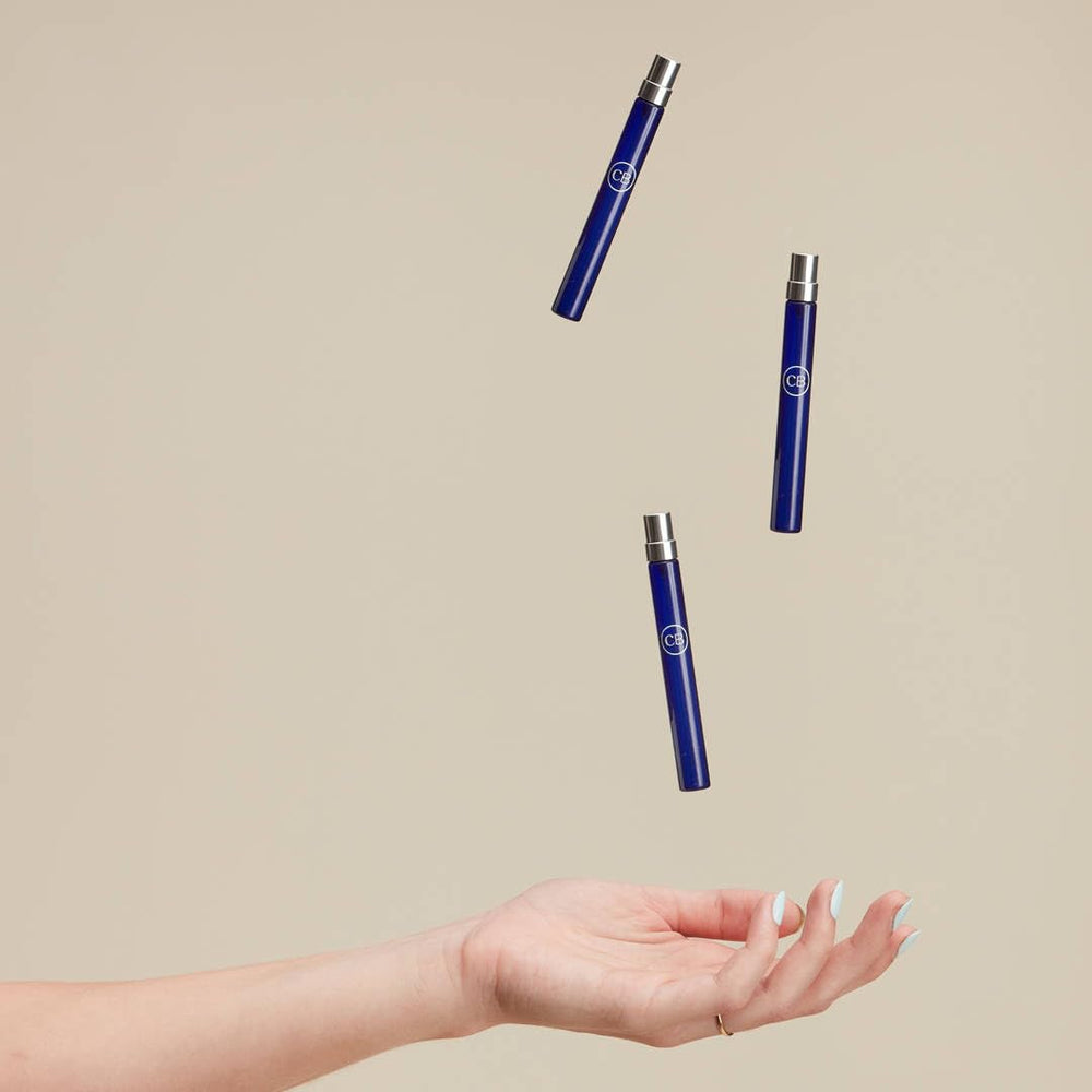 Capri Blue Volcano mini perfume bottle in hand suits evenings and quick refreshes.
