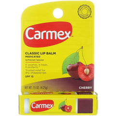 Carmex Click-Stick Cherry applied to lips for on-the-go protection.